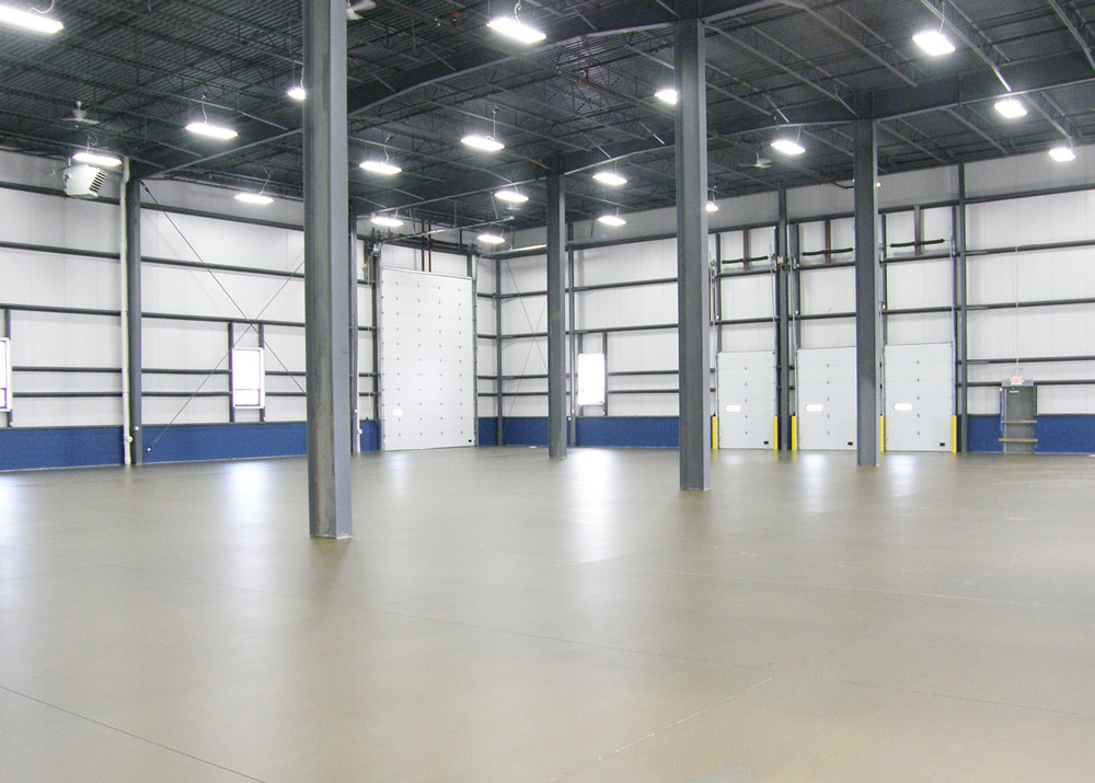 an interior of an industrial steel building