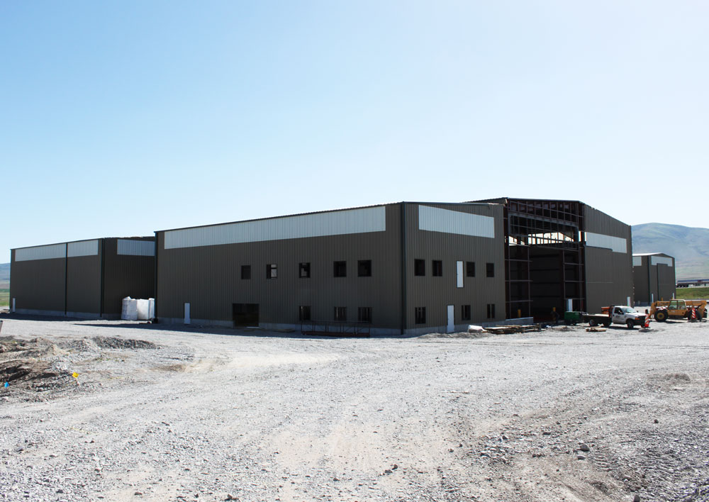 brown steel building under construction