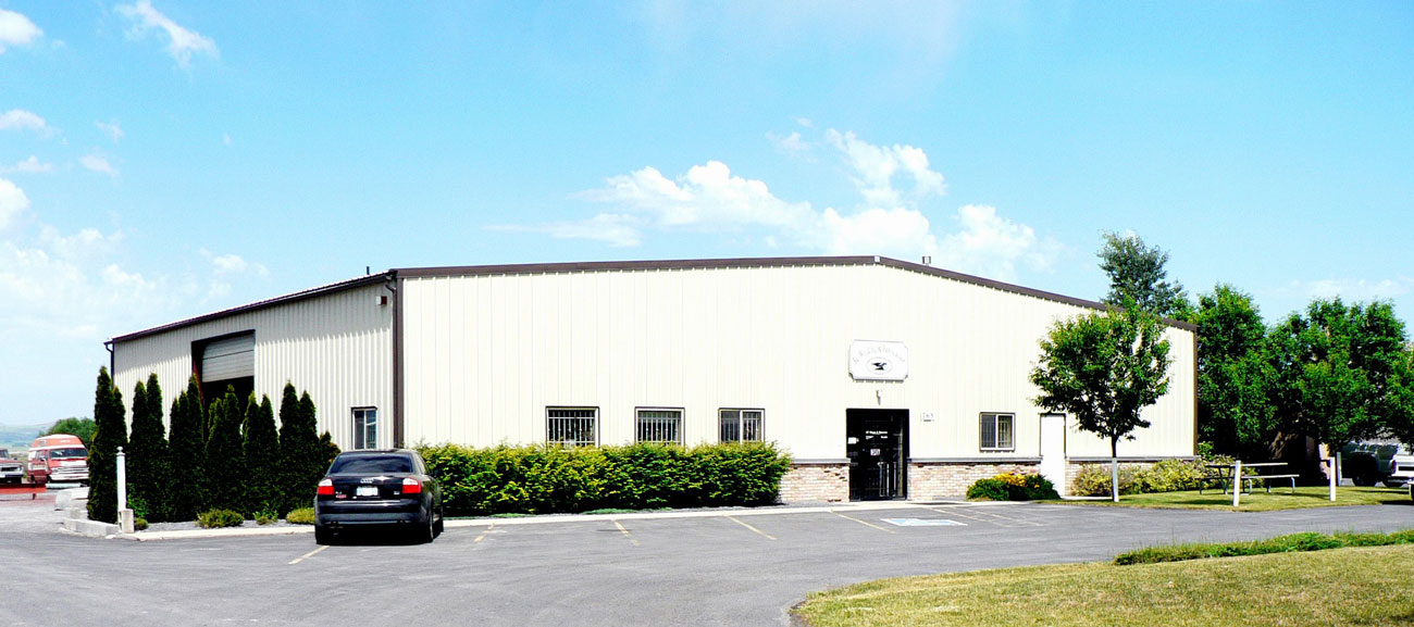 a white steel industrial building