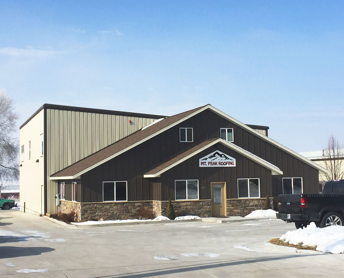 a commercial building made of steel and wainscot