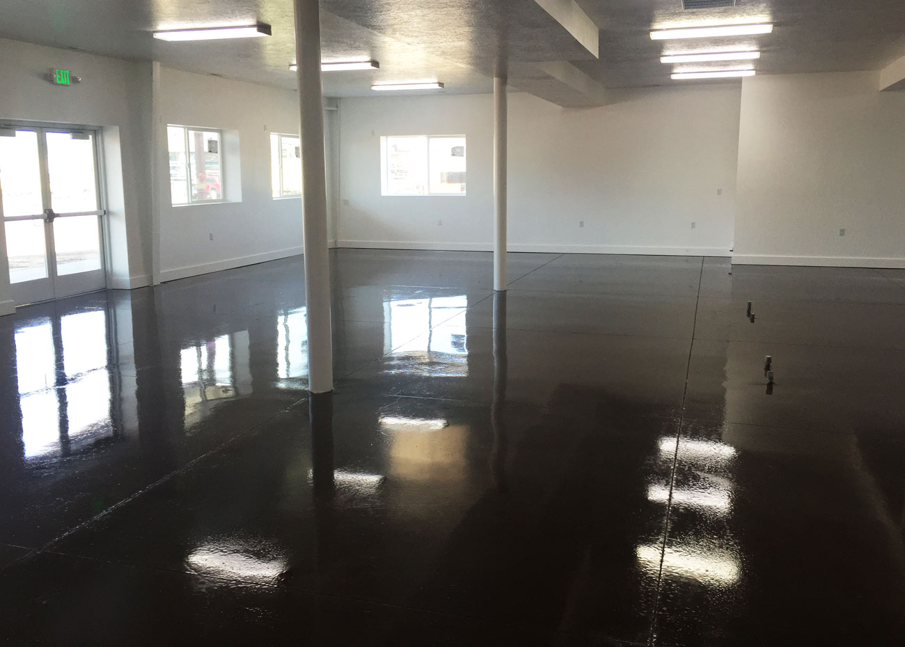 a black polished concrete floor