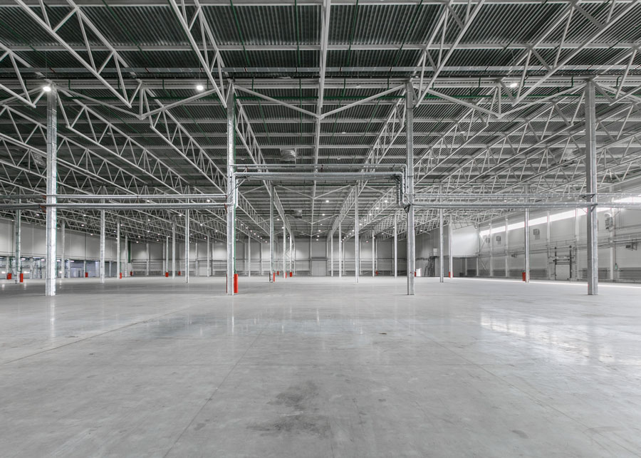 a concrete floor under steel structure